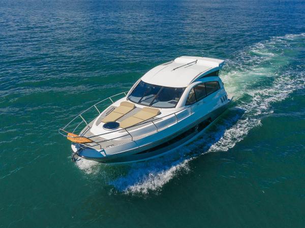 Hanover 375 Inboard 2025 Hanover 375 Outboard cruising on open water.