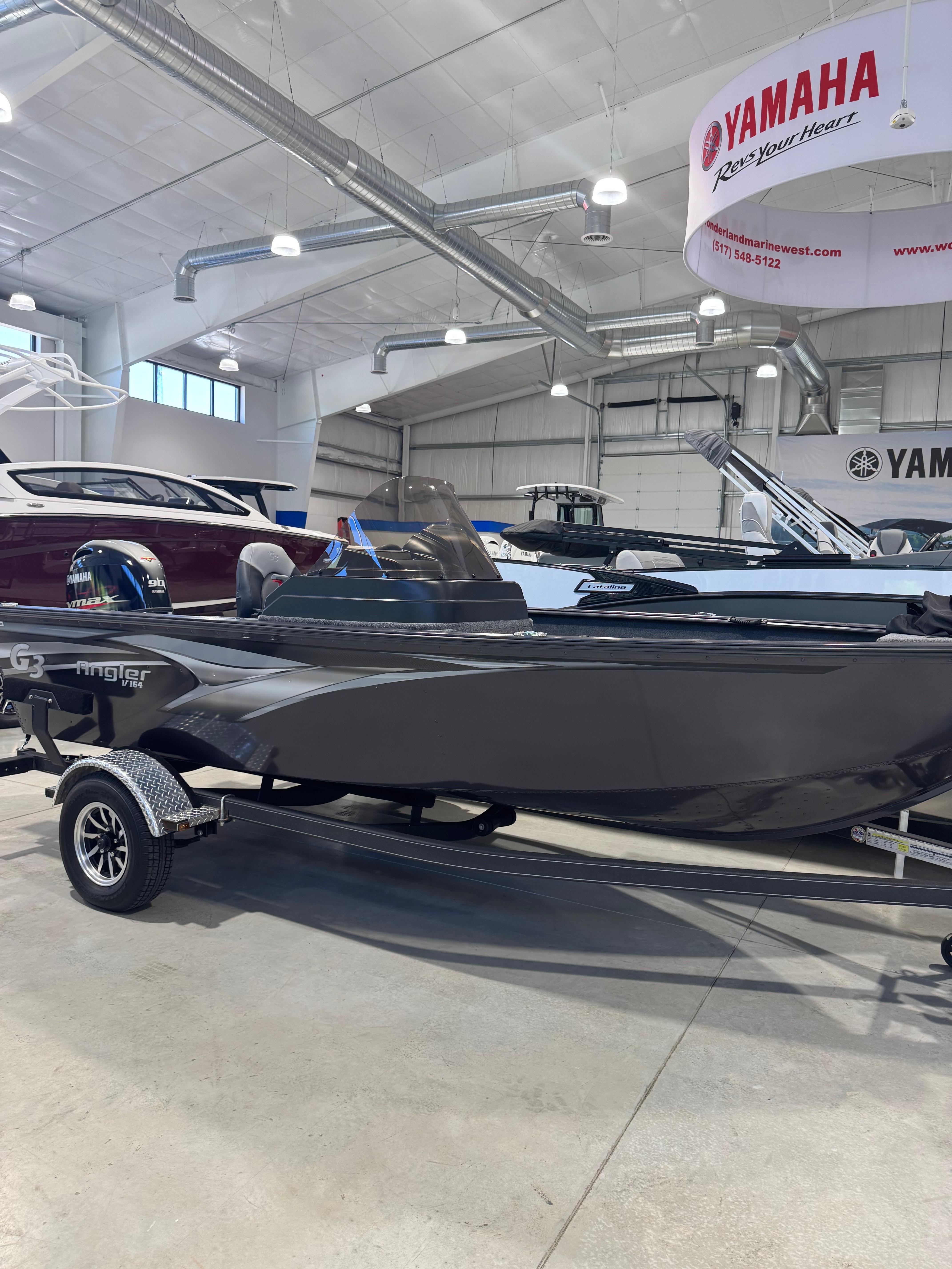 G3 AV-164C Carpet 2025 G3 AV-164C Carpet boat displayed in showroom with Yamaha signage.