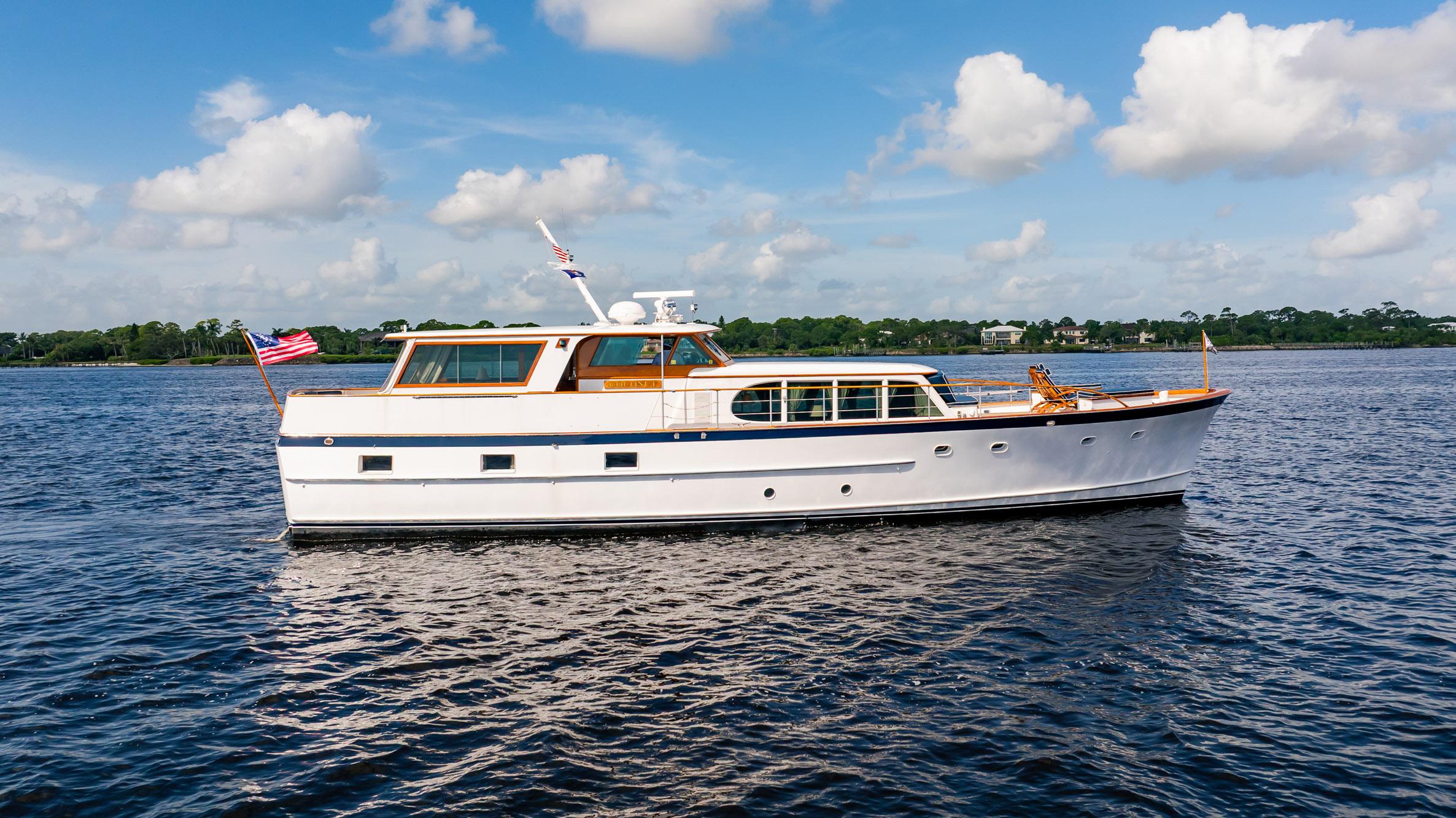 Burger 64 Motor Yacht 1964 Burger 64' Motor Yacht cruising on a sunny day with blue skies.