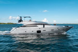 Pershing 92 Luxury 2012 Pershing 92 yacht cruising on open water under clear blue skies.