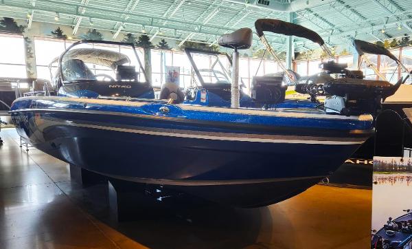 Nitro ZV19 Pro 2025 Nitro ZV19 Pro boat displayed indoors, showcasing sleek blue design and modern features.