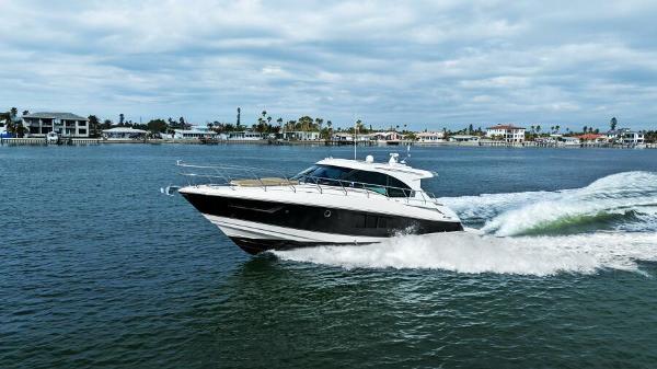 Cruisers Yachts 45 Cantius 2014 Cruisers Yachts 45 Cantius cruising on open water, showcasing sleek design and performance.