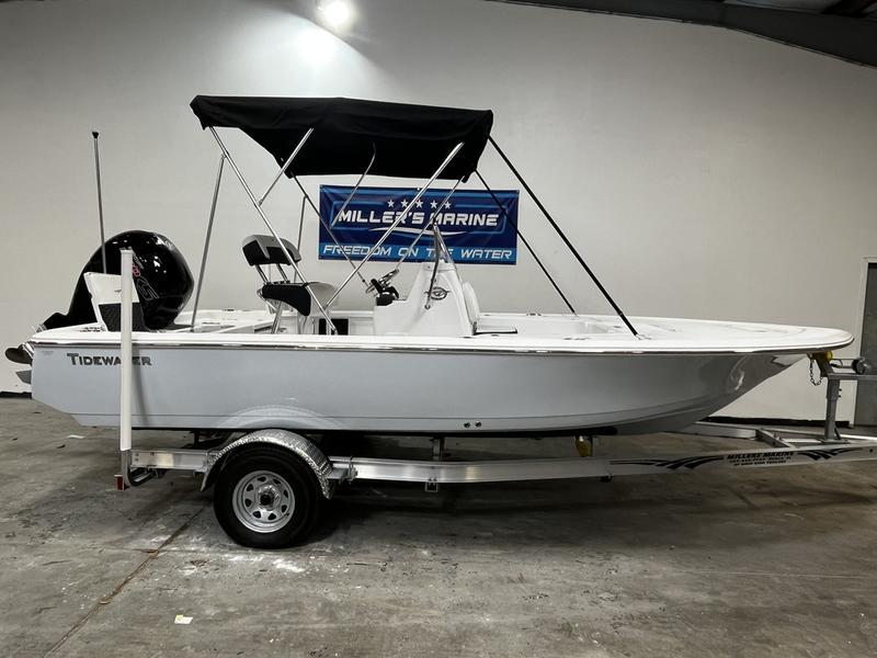 Tidewater 1910 Bay Max 2025 Tidewater 1910 Bay Max boat on trailer, displayed indoors with a black canopy.