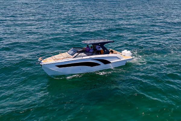 Hanover 347 Outboard 2025 Hanover 347 Outboard boat cruising on open water.