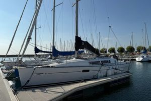 Jeanneau Sun Odyssey 36i Performance 2010 Jeanneau Sun Odyssey 36i Performance sailboat docked in a marina.