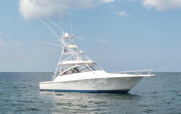 Viking 42 Open 2014 Viking 42 Open yacht on calm sea under blue sky.