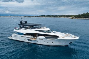 Monte Carlo Yachts MCY 96 Luxurious 2021 Monte Carlo Yachts MCY 96 cruising on serene blue waters.