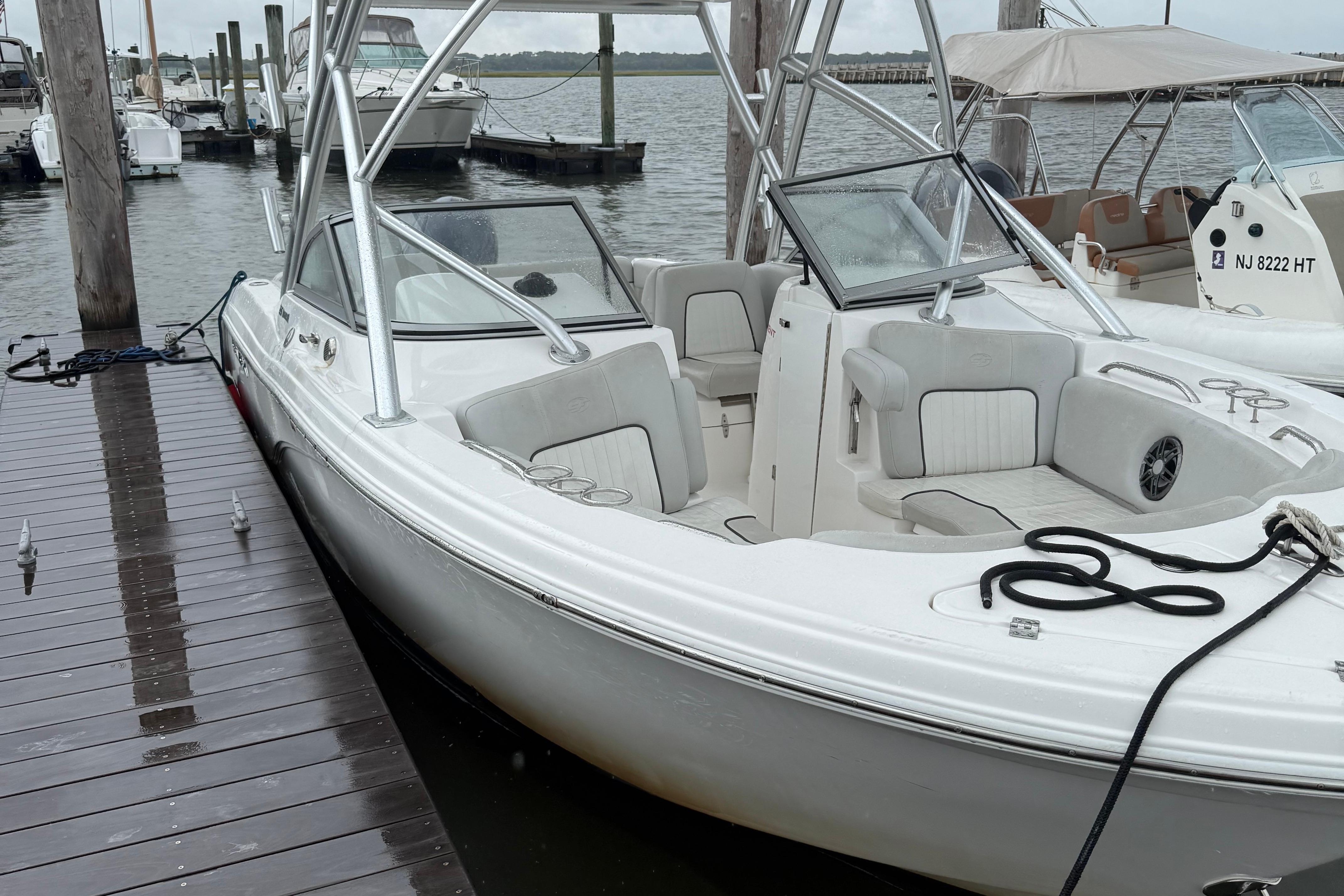 Sea Fox 226 Traveler 2022 Seafox 226 Traveler boat docked, featuring sleek design and comfortable seating.