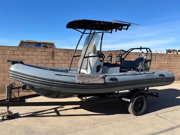 Zodiac Pro 5.5 2020 Zodiac Pro 5.5 inflatable boat on trailer, parked outdoors.