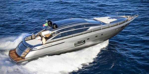 Pershing 62' 2020 Pershing 62' yacht cruising on open sea, showcasing sleek design and luxury features.