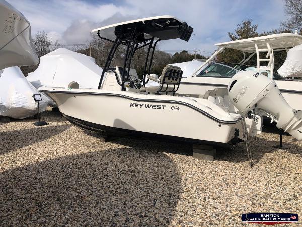 Key West 219 FS 2023 Key West 219 FS boat displayed outdoors on gravel.