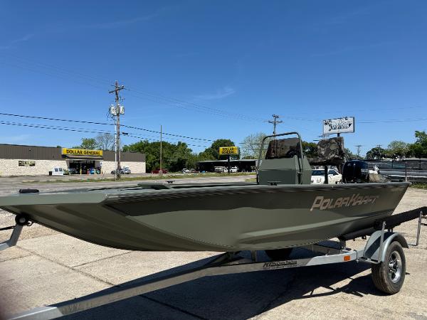 Polar Kraft SMMV1654CC 2023 Polar Kraft SMMV1654CC boat on a trailer in a parking lot.