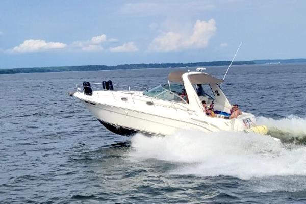 Sea Ray 340 Sundancer 1999 Sea Ray 340 Sundancer cruising on open water.