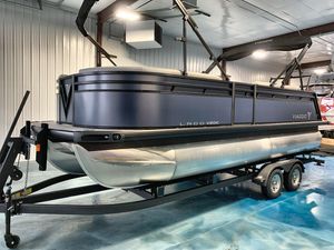 Viaggio Lago V20C 2025 Viaggio Lago V20C pontoon boat in a showroom on a trailer.