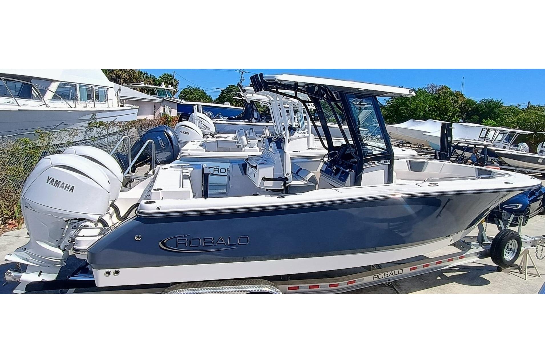 Robalo R250 Center Console 2024 Robalo R250 Center Console boat with Yamaha engines on a trailer.