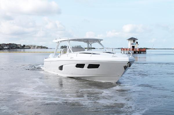 Intrepid 41 Valor 2024 Intrepid 41 Valor boat cruising on calm water under a cloudy sky.