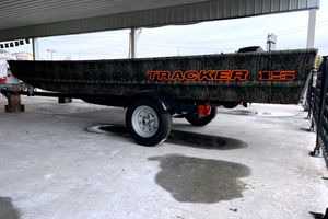 Tracker Grizzly 15 Jon 2026 Tracker Grizzly 15 Jon boat on trailer, displayed under a shelter.
