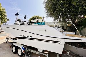 Jeanneau Cap Camarat 7.5 CC Serie 3 2024 Jeanneau Cap Camarat 7.5 CC Serie 3 boat on trailer, outdoor display.