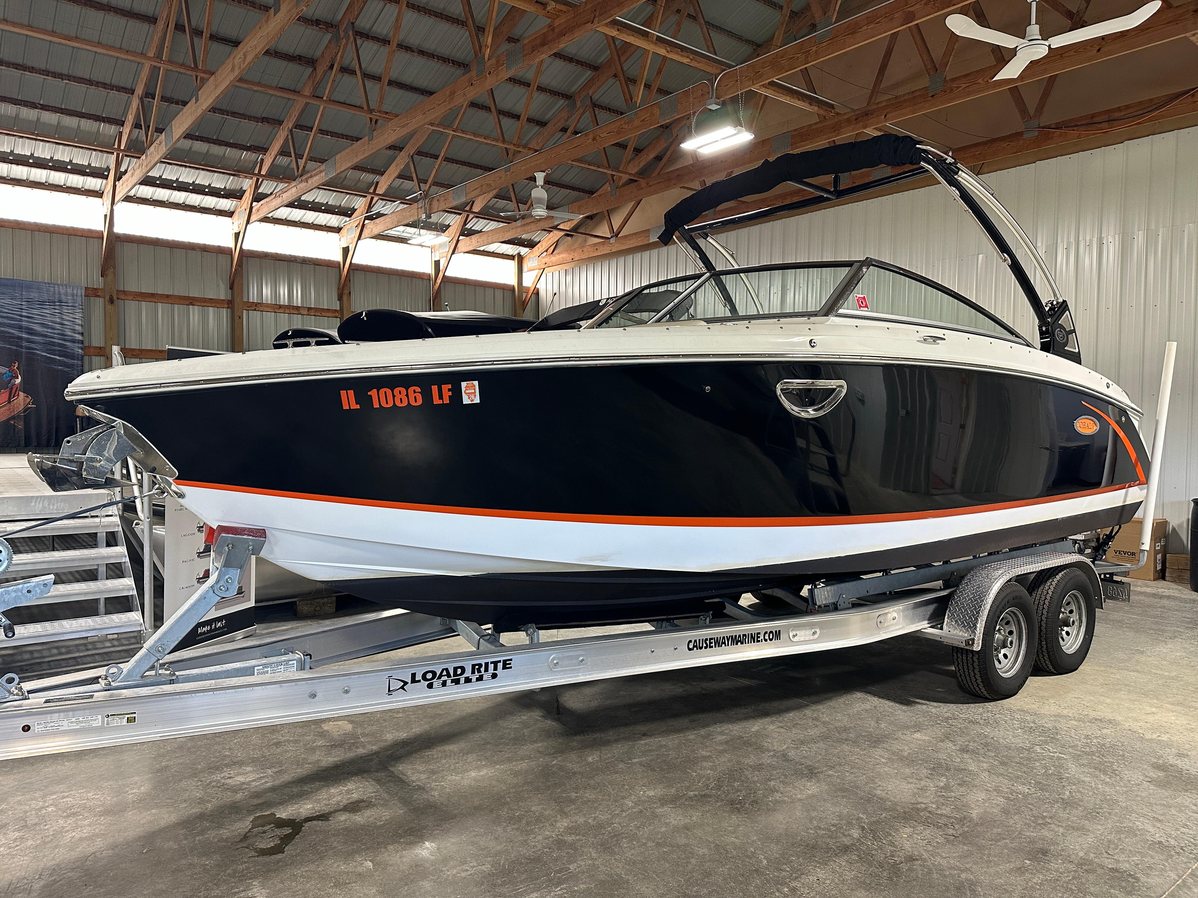 Cobalt R5 2018 Cobalt R5 boat on trailer in a warehouse setting.