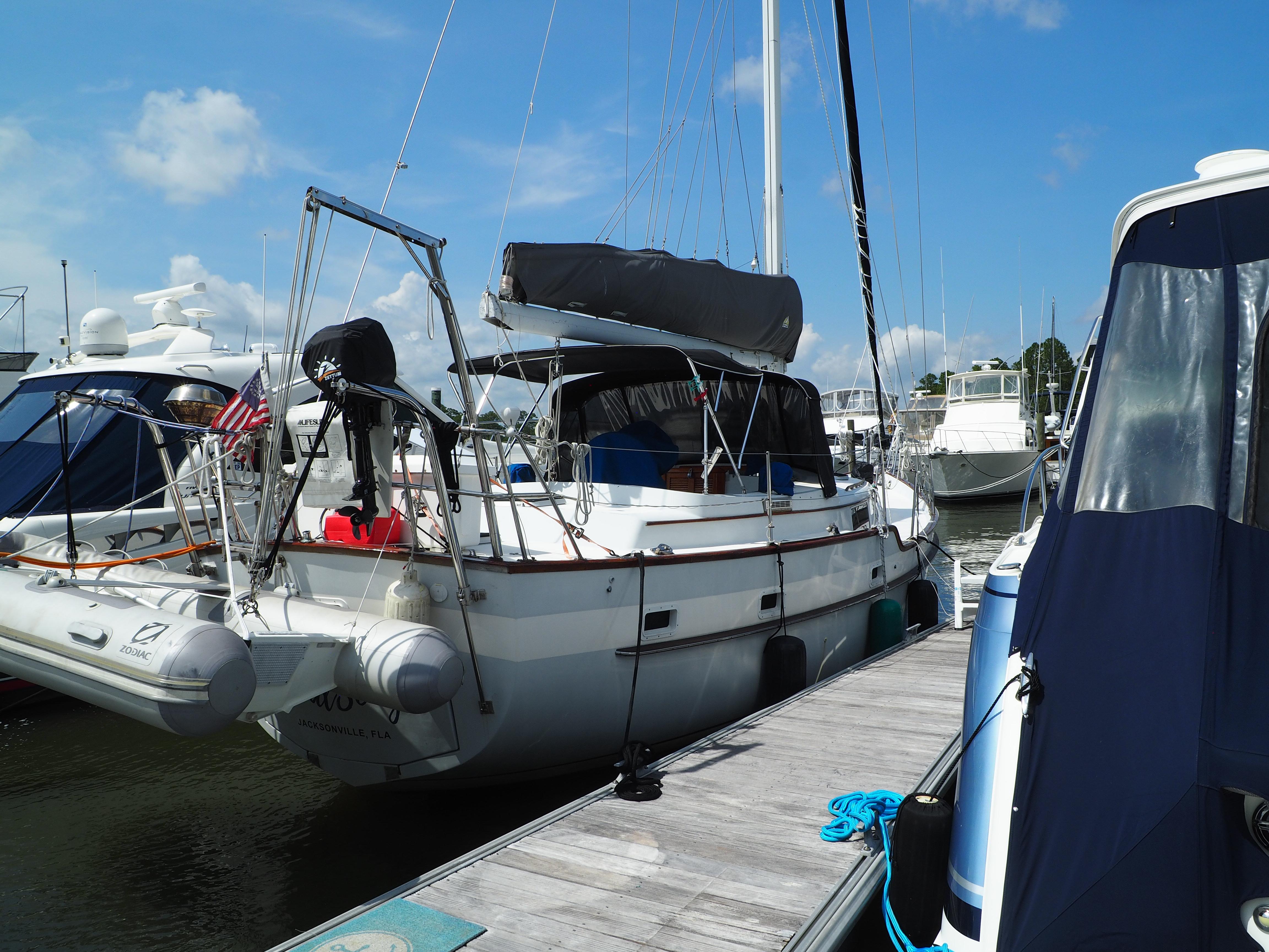 Irwin 43 CC MK III Sailboat Irwin 43 CC MK III, 1990 model, docked at marina with clear skies.