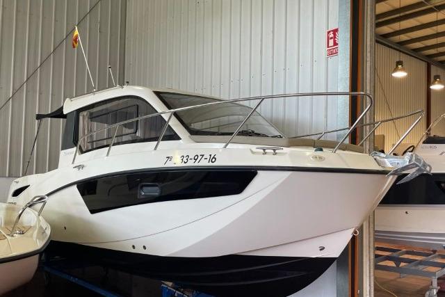Quicksilver Activ 755 Weekend 2016 Quicksilver Activ 755 Weekend boat in storage, side view.