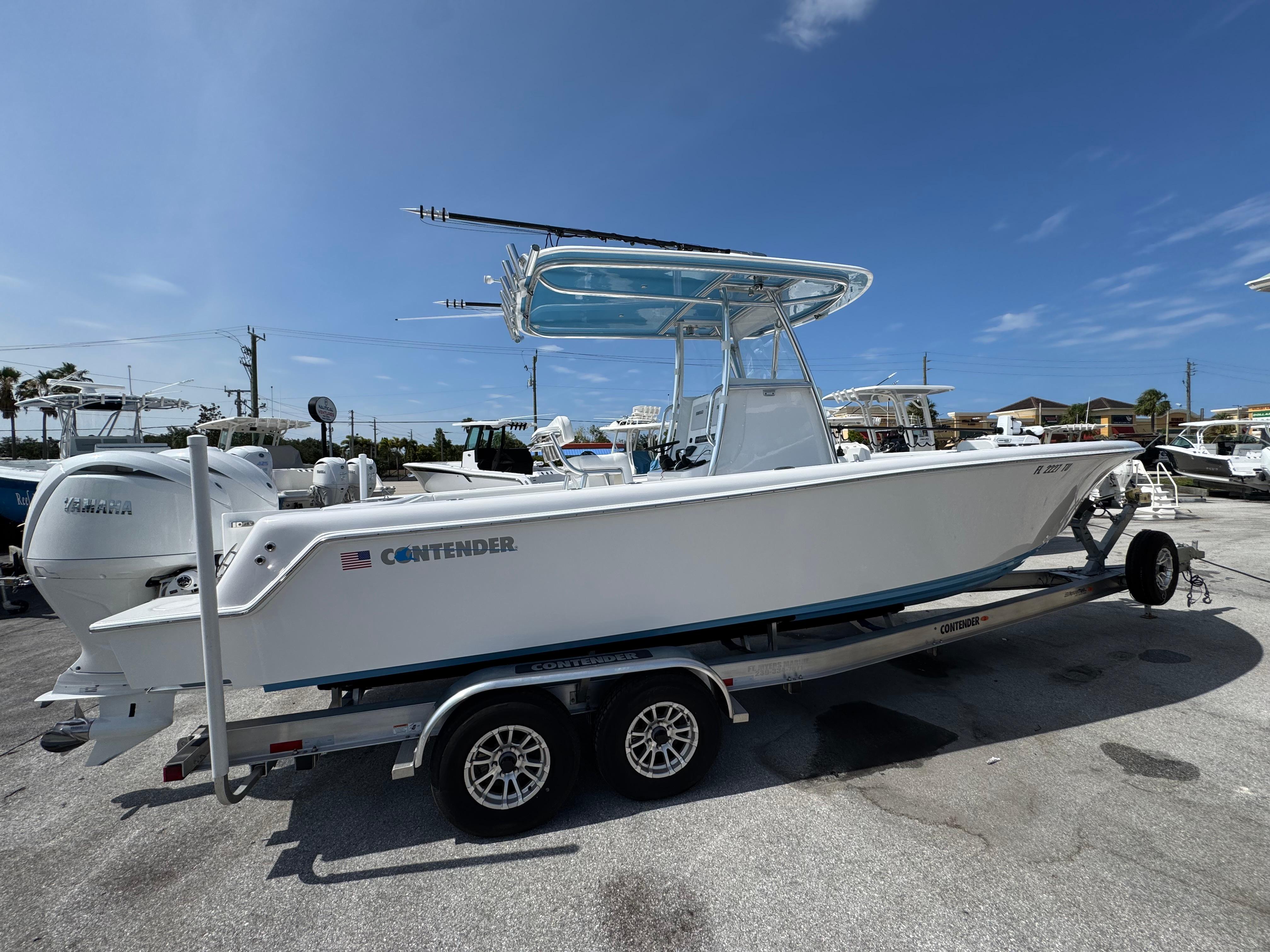 Contender 28 Tournament 2024 Contender 28 Tournament boat on trailer under clear blue sky.