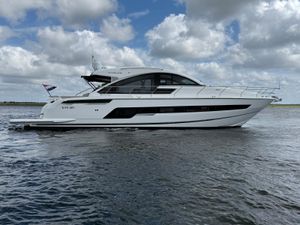 Fairline Targa 53 OPEN 2022 Fairline Targa 53 OPEN yacht cruising on water under cloudy sky.