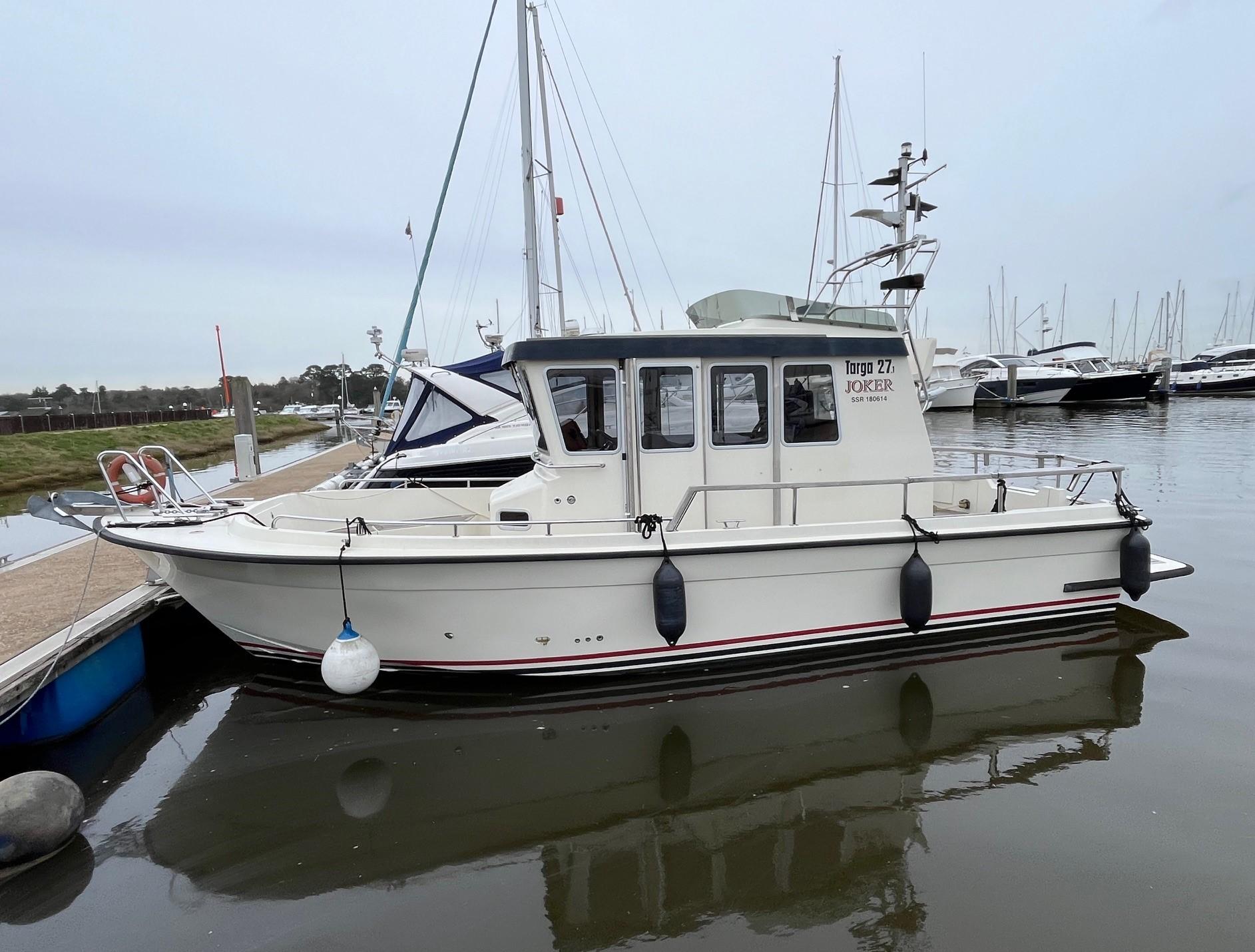 Botnia Targa 27.1 2008 Botnia Targa 27.1 boat docked at marina, side view.