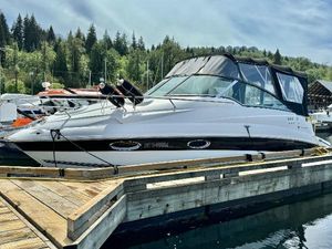Campion 825 Allante 2007 Campion 825 Allante boat docked at a marina with forested background.