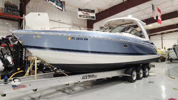 Formula 350 CBR 2018 Formula 350 CBR boat on trailer in indoor storage facility.