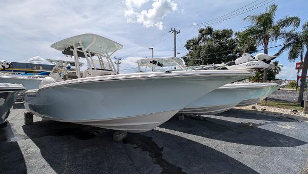 Key West 244 Center Console 2025 Key West 244 Center Console boat displayed outdoors on a sunny day.