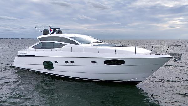 Pershing 62 Luxury 2020 Pershing 62 yacht cruising on open water under cloudy skies.