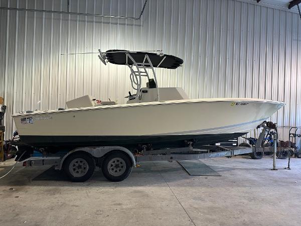 Donzi Center Console 1974 Donzi Center Console boat on trailer in a garage.