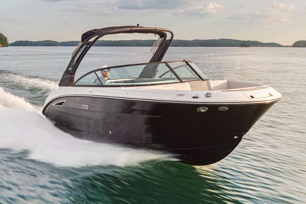 Sea Ray SDX 250 Manufacturer Provided Image: 2025 Sea Ray SDX 250 boat cruising on a lake at high speed.