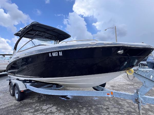 Yamaha Boats 242 Limited S E-Series 2016 Yamaha Boats 242 Limited S E-Series on trailer, under cloudy sky.