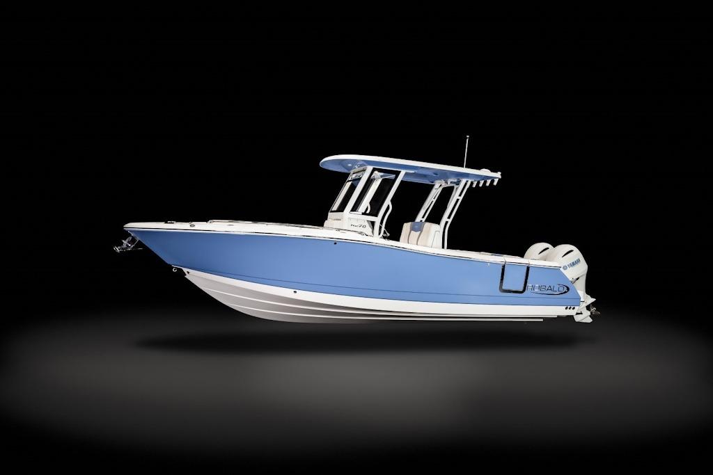 Robalo R270 Center Console 2026 Robalo R270 Center Console boat with blue hull on black background.