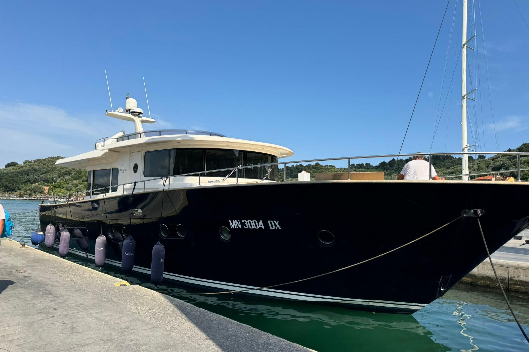 Apreamare Maestro 65 2008 Apreamare Maestro 65 yacht docked at a marina under clear blue skies.
