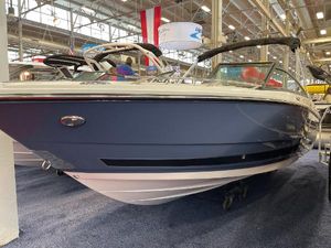 Monterey 218SS Super Sport 2025 Monterey 218 SS boat displayed indoors at a boat show.