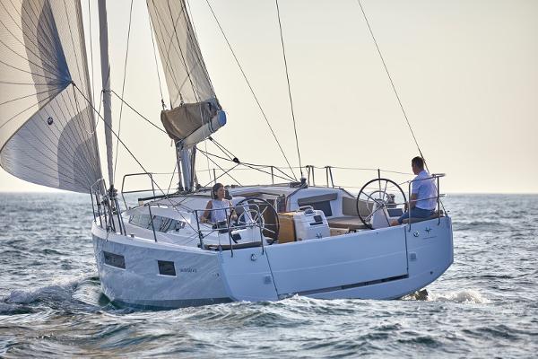 Jeanneau Sun Odyssey 410 2025 Jeanneau Sun Odyssey 410 sailing on open water, showcasing sleek design and performance.
