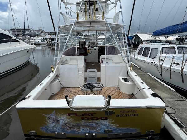 Custom Dick Ward Pirate 34 Sportfish Custom 2005 Dick Ward Pirate 34 Sportfish boat docked at marina, rear view.