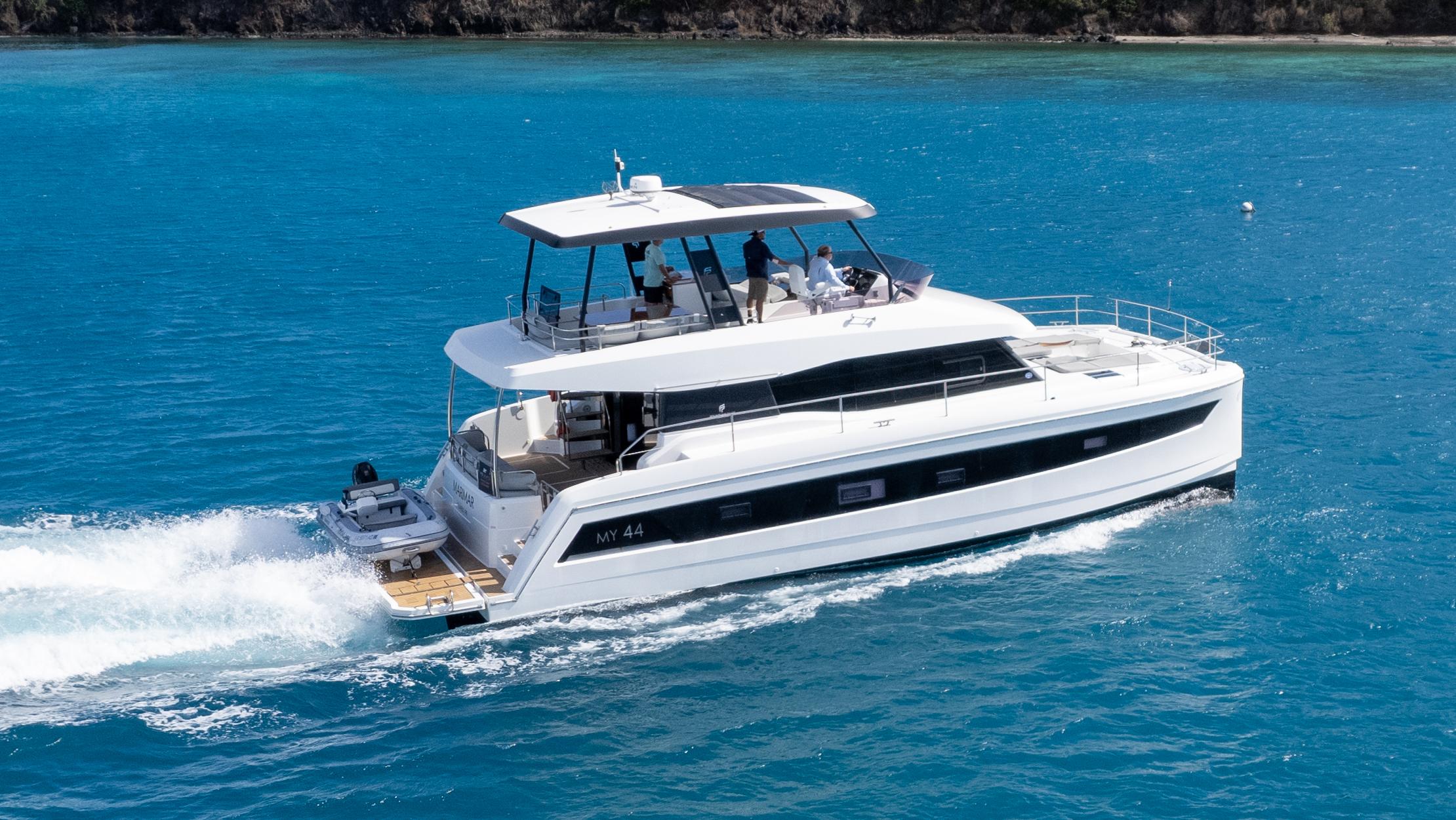 Fountaine Pajot MY44 2021 Fountaine Pajot MY44 yacht cruising on clear blue water.