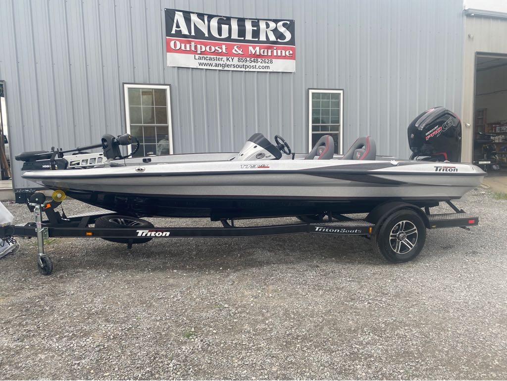 Triton 179 TrX 2024 Triton 179 TrX boat on trailer outside Anglers Outpost & Marine.