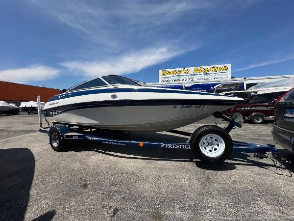 Crownline 180 BR 2002 Crownline 180 BR boat on trailer at Basset Marine dealership.