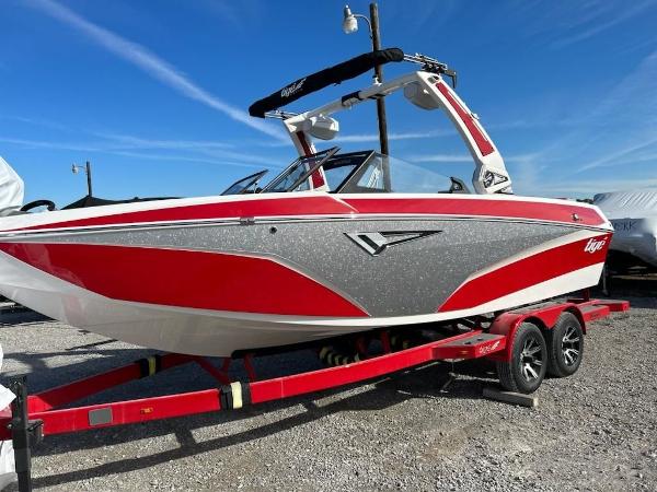 Tigé Z3 2024 Tigé Z3 boat in red and gray on a trailer.