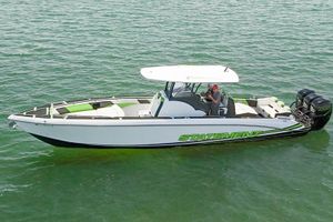 Statement 380 Open 2018 Statement 380 Open boat on water, featuring sleek design and vibrant green accents.