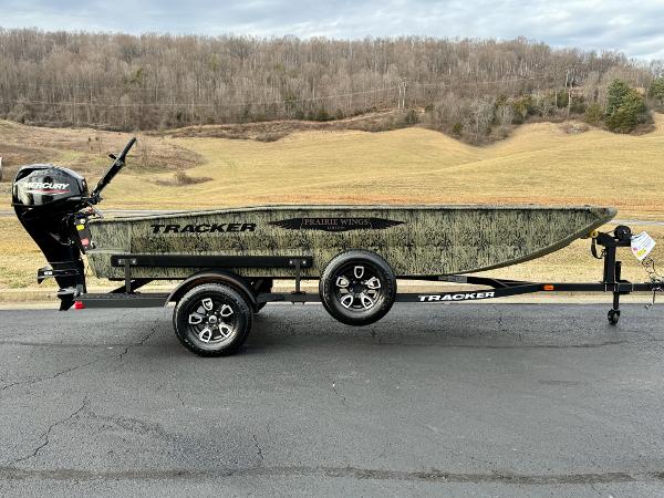 Tracker Grizzly 1650 T Prairie Wings Edition 2025 Tracker Grizzly 1650 T Prairie Wings Edition boat on trailer, outdoors.