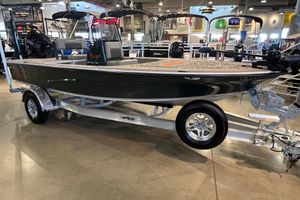Mako 18 Pro Skiff Backwater Edition 2025 Mako 18 Pro Skiff Backwater Edition boat on display in showroom.