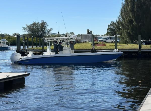 Custom Infusion 34 CC 2021 Custom Infusion 34 CC boat docked on a sunny day.
