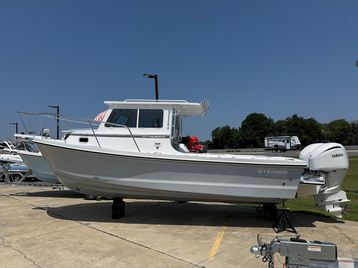 Steiger Craft 28 Fisherman 2026 Steiger Craft 28 Fisherman boat with Yamaha engine on display outdoors.