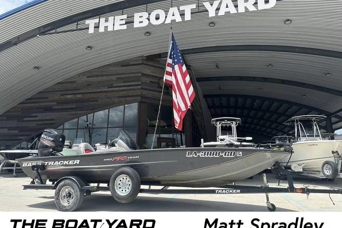 Tracker Pro Team 190 TX 2015 Tracker Pro Team 190 TX boat with American flag at The Boat Yard.